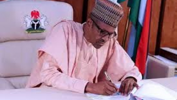 Buhari signs 2021 budget into law
